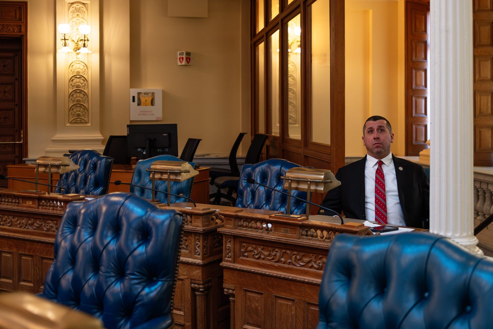 Assemblyman Bergen at his desk in the Assembly chamber